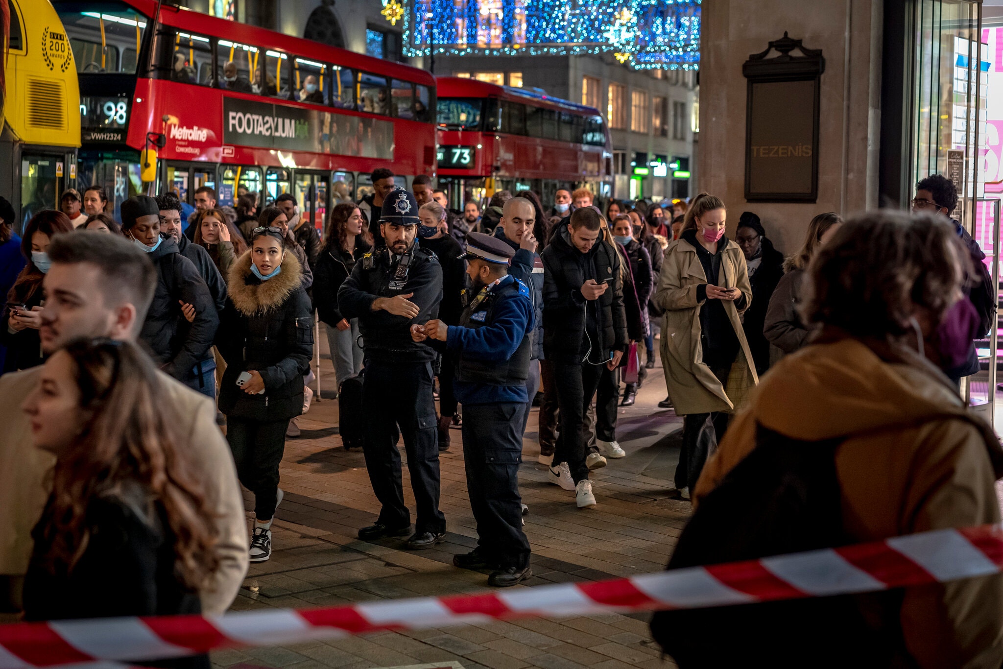 Shopping in Oxford Circus in London last week. The new lockdown will apply to nearly 20 million people, a third of England's population.Credit...Andrew Testa for The New York Times